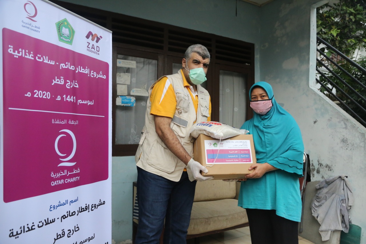 Qatar Charity distributes food packages for Indonesians affected by COVID-19